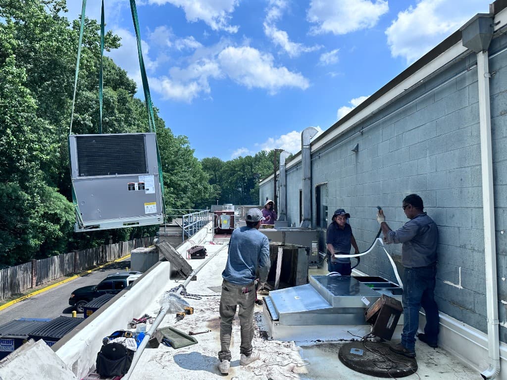 Team of Maven Services technicians on the job
